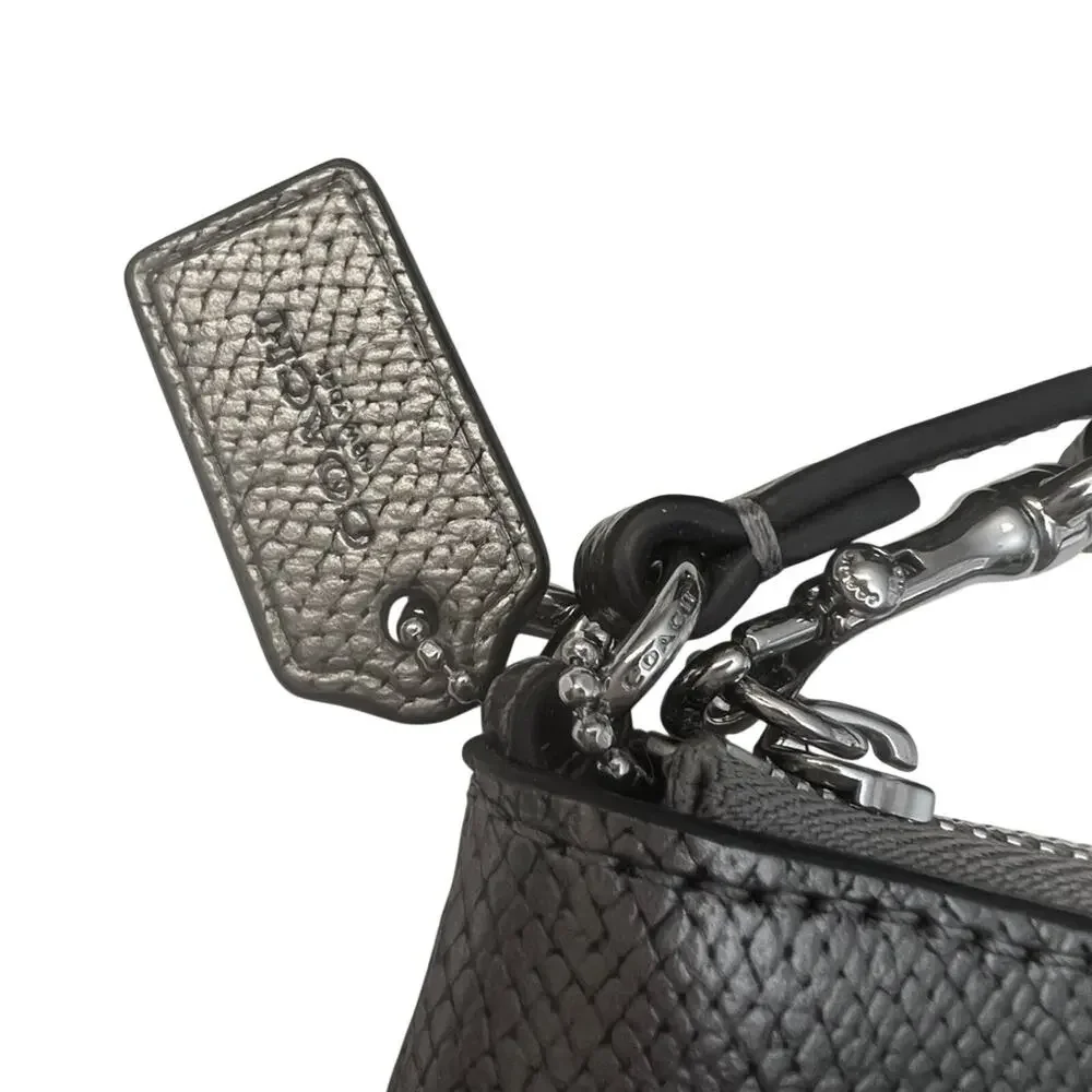 EUC Coach Metallic Silver Wristlet with Bow Detail